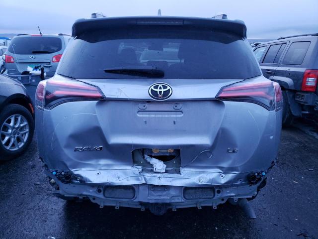 Photo 6 from auction – 2018 TOYOTA RAV4 LE with VIN 2T3ZFREV7JW422908