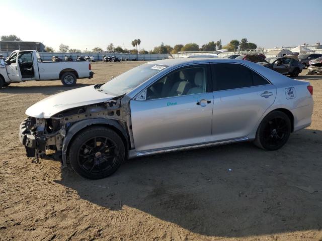 TOYOTA CAMRY L 2014 with VIN 4T4BF1FK8ER379580 - Photo from auction