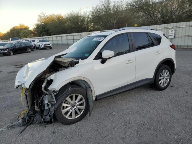 MAZDA CX-5 SPORT 2014 with VIN JM3KE2BE9E0369730 - Photo from auction