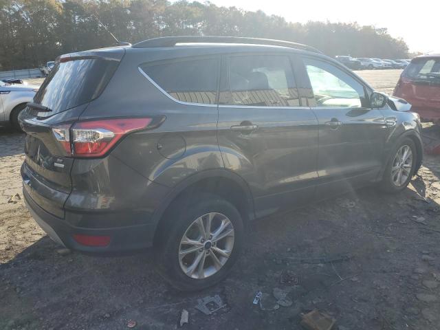 Photo 3 from auction – 2018 FORD ESCAPE SE with VIN 1FMCU0GD4JUC54746