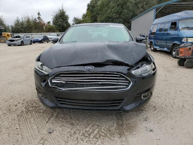 Photo 5 from auction – 2014 FORD FUSION SE with VIN 3FA6P0H90ER340643