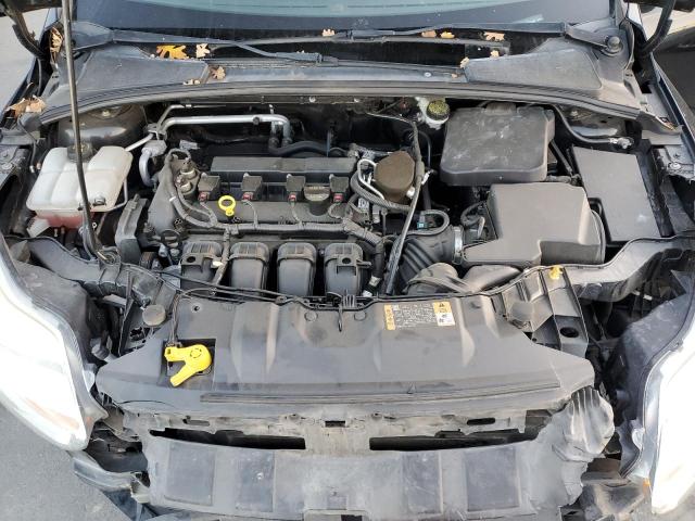 Foto 11 de la subasta – 2014 FORD FOCUS SE con VIN 1FADP3K28EL375434