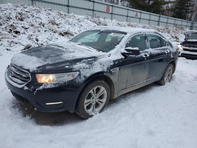 FORD TAURUS SEL 2014 with VIN 1FAHP2E84EG100311 - Photo from auction