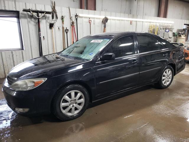 TOYOTA CAMRY LE 2003 with VIN 4T1BF30K93U056036 - Photo from auction
