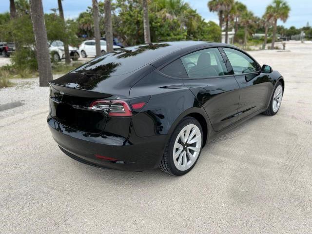 Photo 4 from auction – 2022 TESLA MODEL 3 with VIN 5YJ3E1EAXNF291217