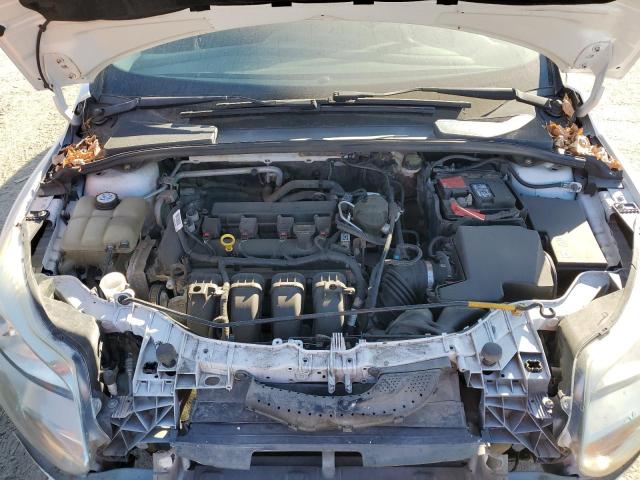 Photo 11 from auction – 2014 FORD FOCUS S with VIN 1FADP3E26EL282634