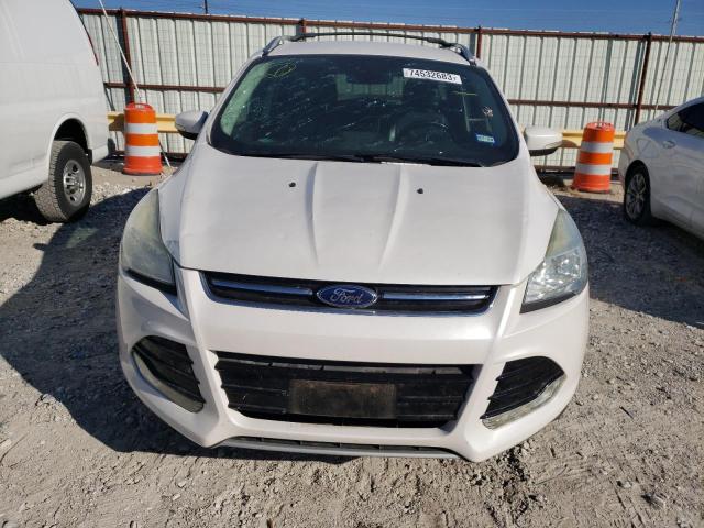 Photo 5 from auction – 2015 FORD ESCAPE TIT with VIN 1FMCU0J91FUC78580