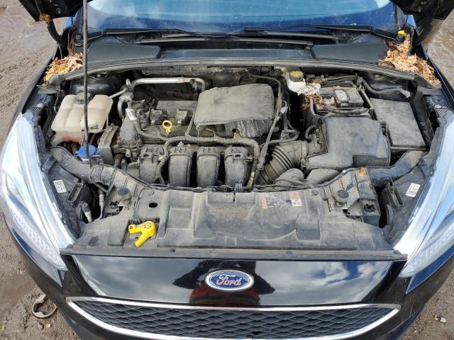 Photo 11 from auction – 2017 FORD FOCUS SE with VIN 1FADP3F20HL340854