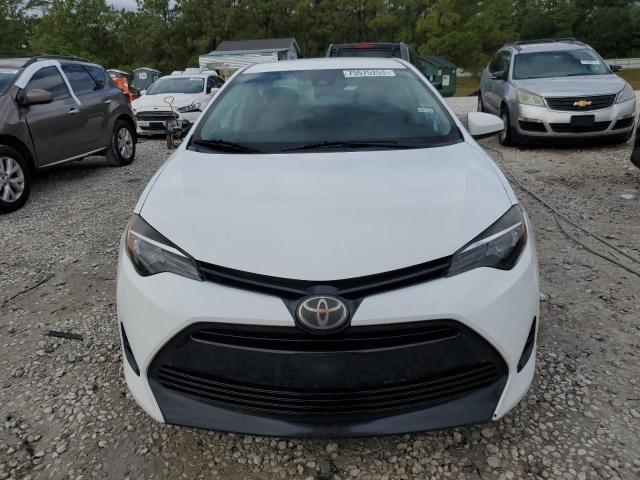 Photo 5 from auction – 2017 TOYOTA COROLLA L with VIN 5YFBURHE1HP643248