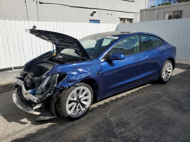 TESLA MODEL 3 2022 with VIN 5YJ3E1EAXNF369902 - Photo from auction