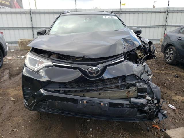 Photo 5 from auction – 2017 TOYOTA RAV4 LE with VIN 2T3BFREV6HW686830