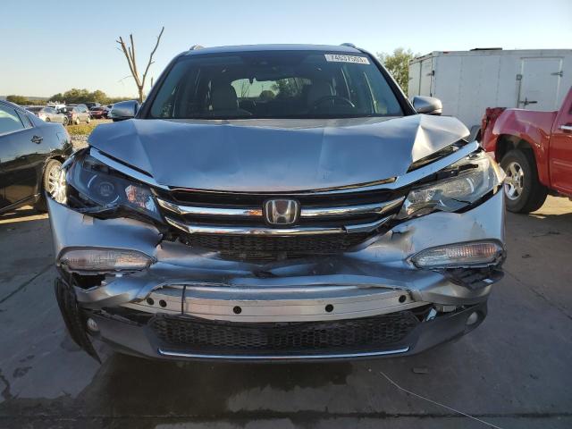 Photo 5 from auction – 2016 HONDA PILOT ELIT with VIN 5FNYF6H06GB044024