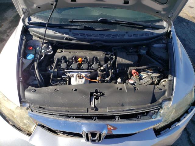 Photo 11 from auction – 2011 HONDA CIVIC LX with VIN 19XFA1F51BE024107