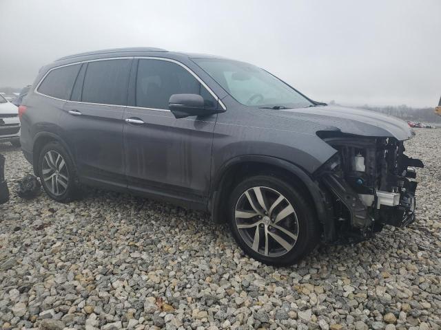 Photo 4 from auction – 2016 HONDA PILOT TOUR with VIN 5FNYF5H9XGB034704