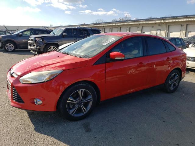FORD FOCUS SE 2014 with VIN 1FADP3F24EL240588 - Photo from auction