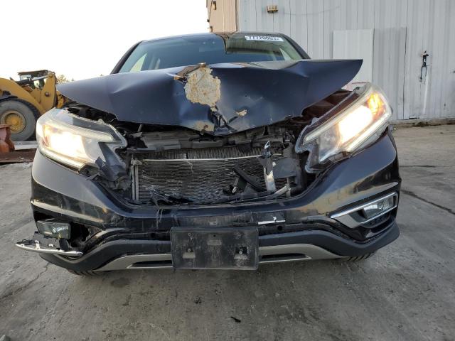 Photo 5 from auction – 2015 HONDA CR-V EX with VIN 2HKRM4H51FH707428