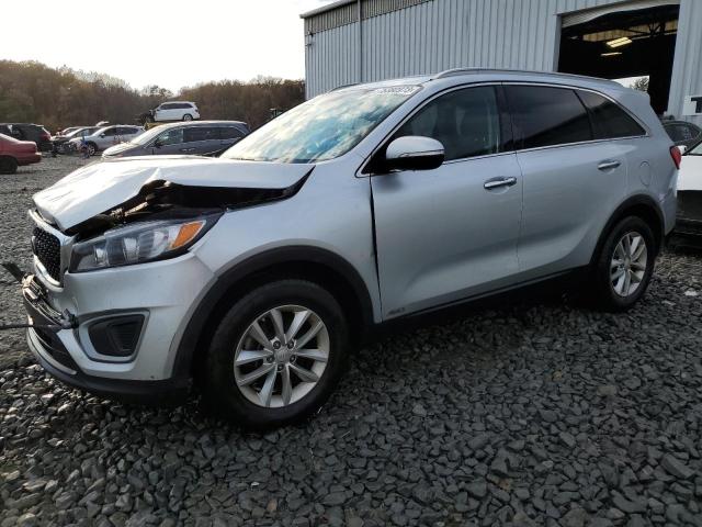 KIA SORENTO LX 2016 with VIN 5XYPGDA38GG051065 - Photo from auction