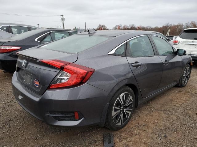 Photo 3 from auction – 2016 HONDA CIVIC EX with VIN 2HGFC1F32GH656152