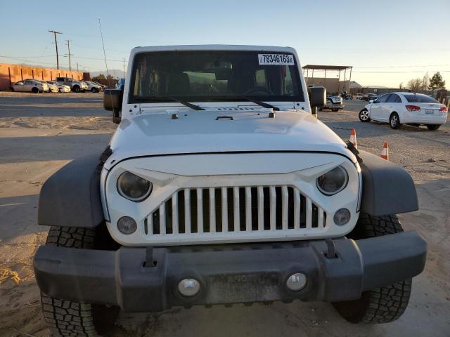 Photo 5 from auction – 2015 JEEP WRANGLER U with VIN 1C4BJWDG5FL593152