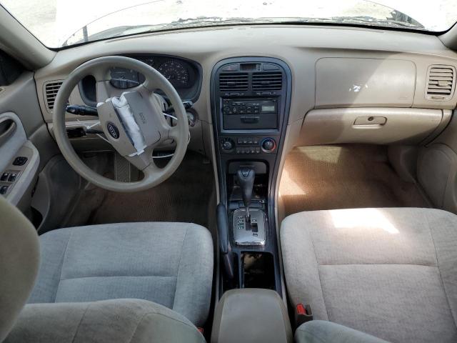 Photo 8 from auction – 2004 KIA OPTIMA LX with VIN KNAGD126445265133