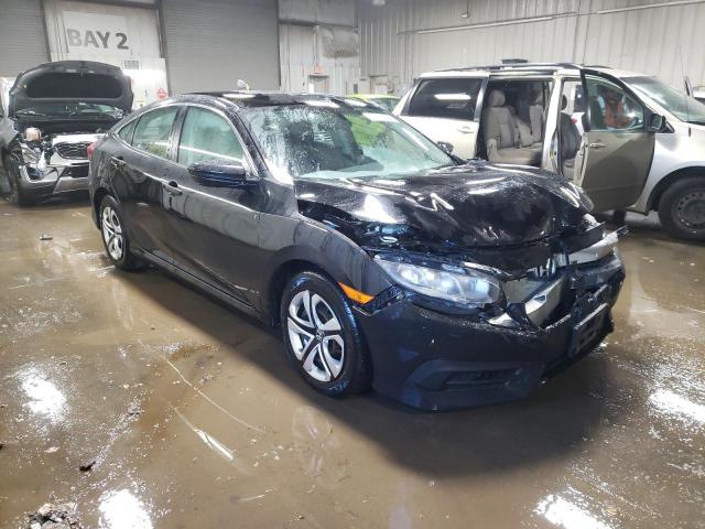 Photo 4 from auction – 2018 HONDA CIVIC LX with VIN 19XFC2E50JE014409