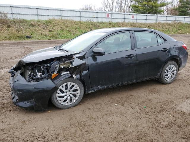 TOYOTA COROLLA L 2019 with VIN 5YFBURHE5KP879487 - Photo from auction