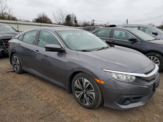Photo 4 from auction – 2016 HONDA CIVIC EX with VIN 2HGFC1F32GH656152