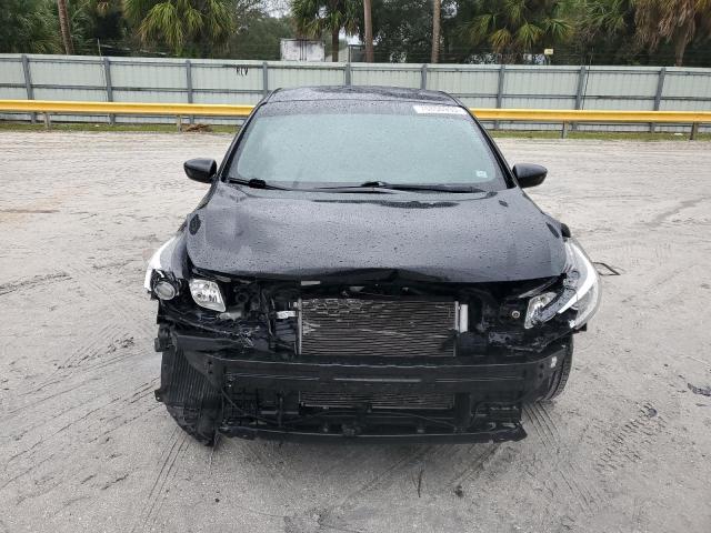 Photo 5 from auction – 2017 KIA FORTE LX with VIN 3KPFK4A71HE110985