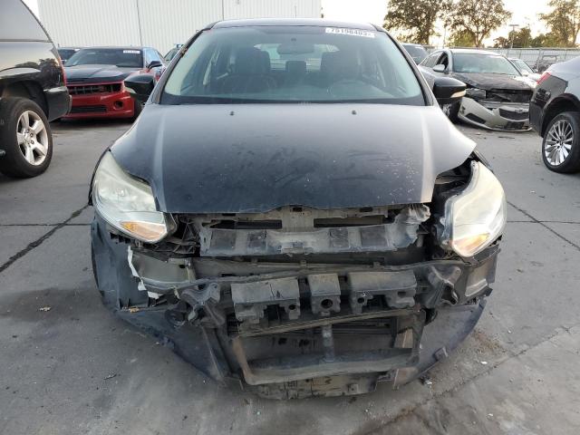 Foto 5 de la subasta – 2014 FORD FOCUS SE con VIN 1FADP3K28EL375434