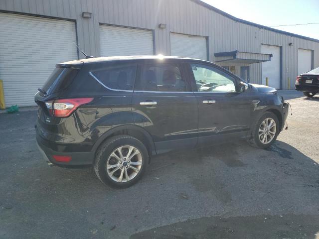Photo 3 from auction – 2017 FORD ESCAPE SE with VIN 1FMCU0G98HUC88808