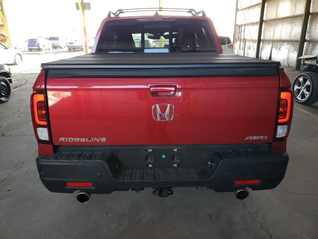 Photo 6 from auction – 2022 HONDA RIDGELINE with VIN 5FPYK3F70NB031543
