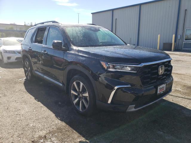 Photo 4 from auction – 2023 HONDA PILOT TOUR with VIN 5FNYG2H75PB014290