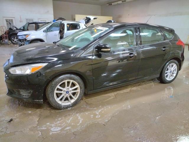 FORD FOCUS SE 2017 with VIN 1FADP3K29HL204311 - Photo from auction