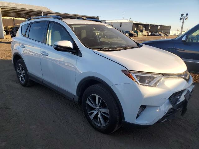 Photo 4 from auction – 2017 TOYOTA RAV4 XLE with VIN JTMRFREV0HD209953
