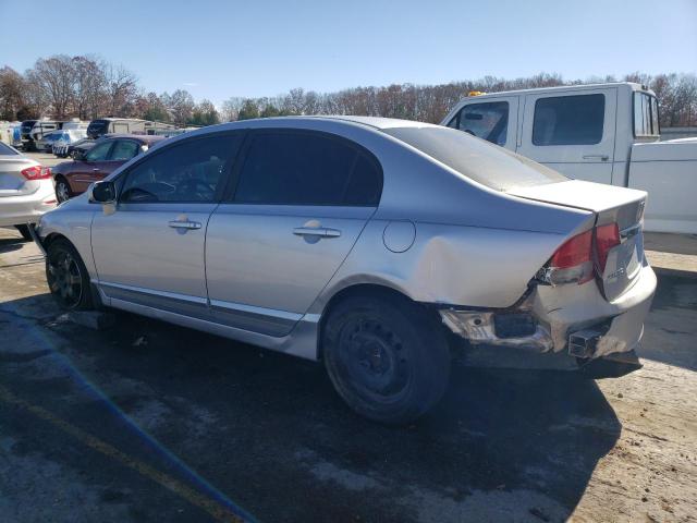Photo 2 from auction – 2011 HONDA CIVIC LX with VIN 19XFA1F51BE024107