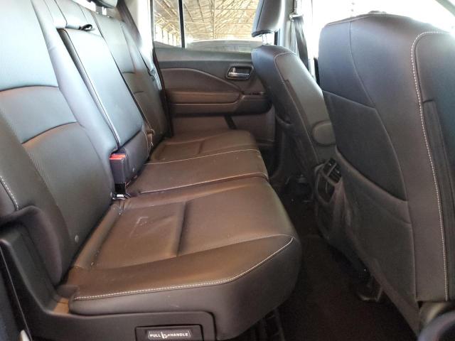 Photo 10 from auction – 2022 HONDA RIDGELINE with VIN 5FPYK3F70NB031543