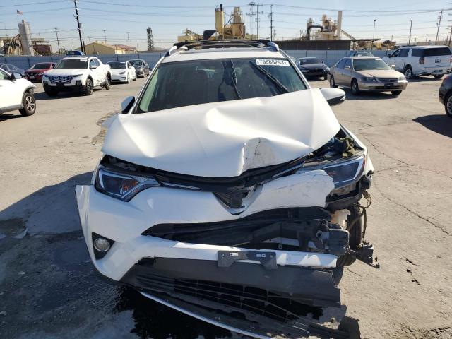 Photo 5 from auction – 2016 TOYOTA RAV4 XLE with VIN JTMWFREV4GJ081669