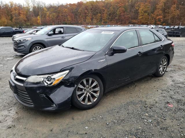 TOYOTA CAMRY HYBR 2015 with VIN 4T1BD1FK3FU168921 - Photo from auction