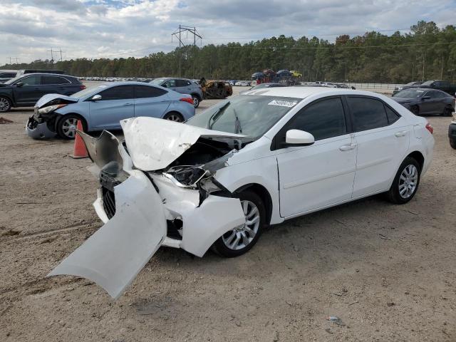TOYOTA COROLLA L 2014 with VIN 5YFBURHE0EP170633 - Photo from auction