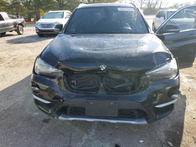 Photo 12 from auction – 2016 BMW X1 XDRIVE2 with VIN WBXHT3C35G5E50005