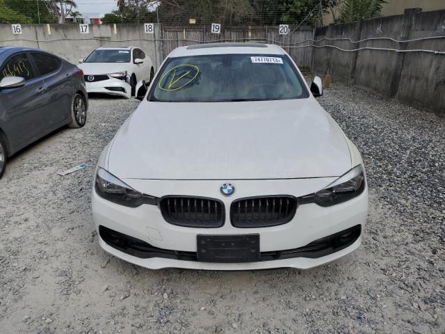 Photo 5 from auction – 2016 BMW 320 I with VIN WBA8E1G51GNT38125