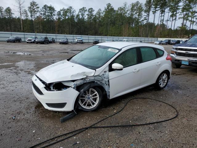 FORD FOCUS SE 2017 with VIN 1FADP3K27HL335737 - Photo from auction