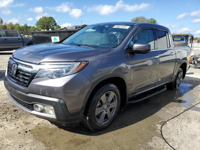 HONDA RIDGELINE 2020 with VIN 5FPYK3F74LB005833 - Photo from auction