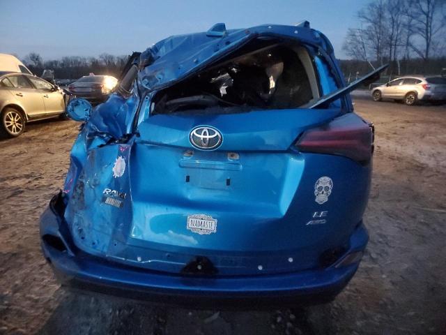 Photo 6 from auction – 2017 TOYOTA RAV4 LE with VIN JTMBFREV5HJ122522