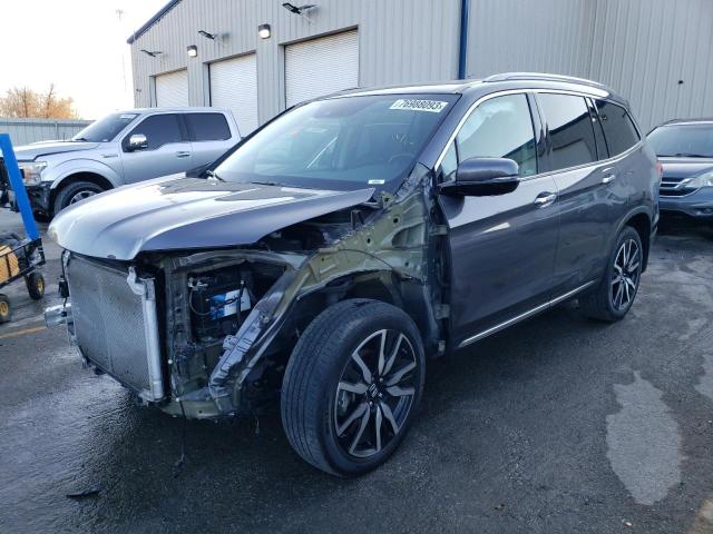 HONDA PILOT TOUR 2021 with VIN 5FNYF6H96MB009428 - Photo from auction