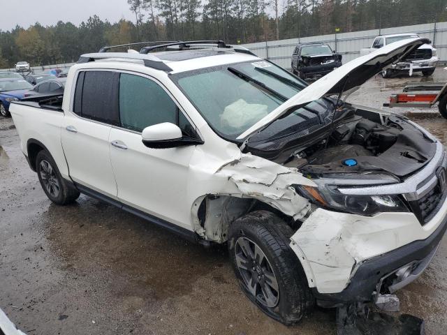 Photo 4 from auction – 2019 HONDA RIDGELINE with VIN 5FPYK3F70KB018531