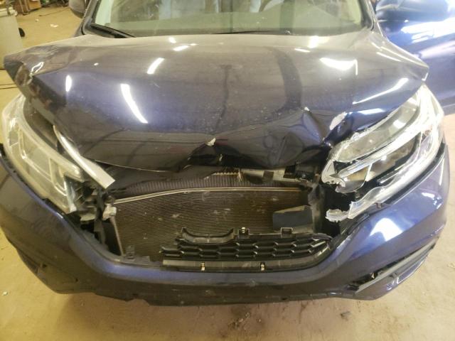 Photo 12 from auction – 2015 HONDA CR-V LX with VIN 5J6RM4H39FL084645