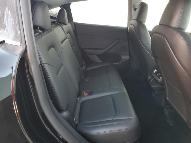 Photo 11 from auction – 2023 TESLA MODEL Y with VIN 7SAYGDEE6PA078952