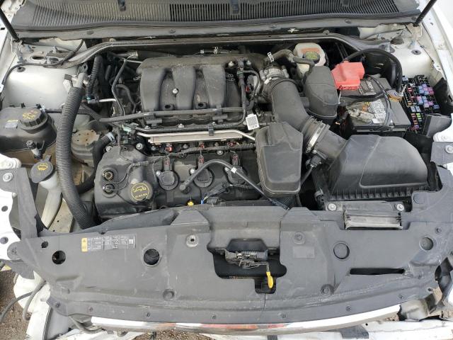 Photo 11 from auction – 2015 FORD TAURUS SE with VIN 1FAHP2D84FG107049