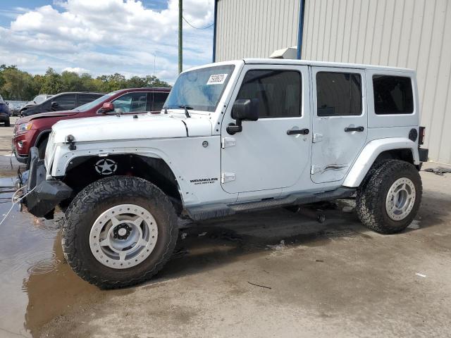 JEEP WRANGLER U 2011 with VIN 1J4BA3H10BL615809 - Photo from auction